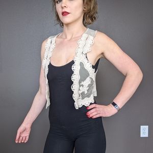 S tan floral crochet upcycled elephant patch vest